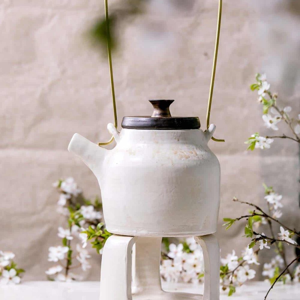 white-and-black-handmade-ceramic-teapot-for-tea-ce-65G9ZT6.jpg